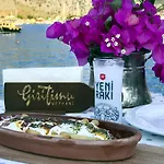 Giritimu Evleri بيت للعطل
